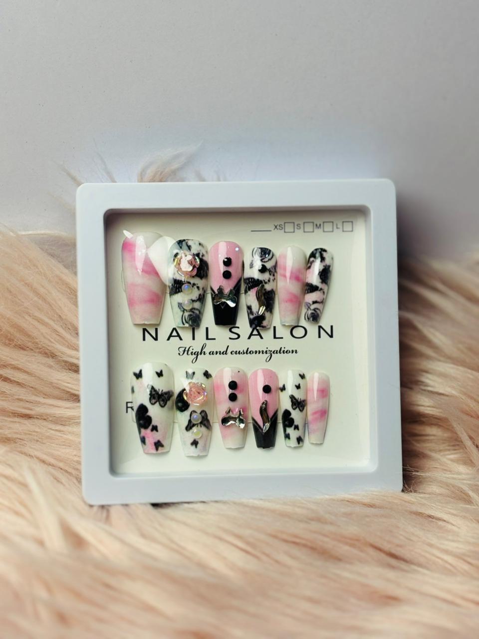 Beige press-on nails with gold beaded lines and shimmer finish, luxury style from Amora Mega Store.
