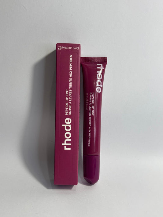 Rhode Peptide Lip Tint in Raspberry Jelly – vibrant berry pink lip tint with glossy hydrating finish.”
“Rhode Raspberry Jelly lip tint – bright pink peptide lip care, smooth and plumping effect