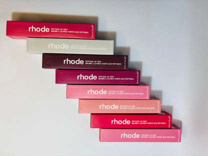 Rhode Peptide Lip Tint complete collection – all shades including Espresso, Toast, Ribbon, Raspberry Jelly, Jelly Bean, Salty Tan, Guava Spritz, Page Vine, and French Toast, hydrating peptide-infused lip care with glossy finish, cruelty-free clean beauty.