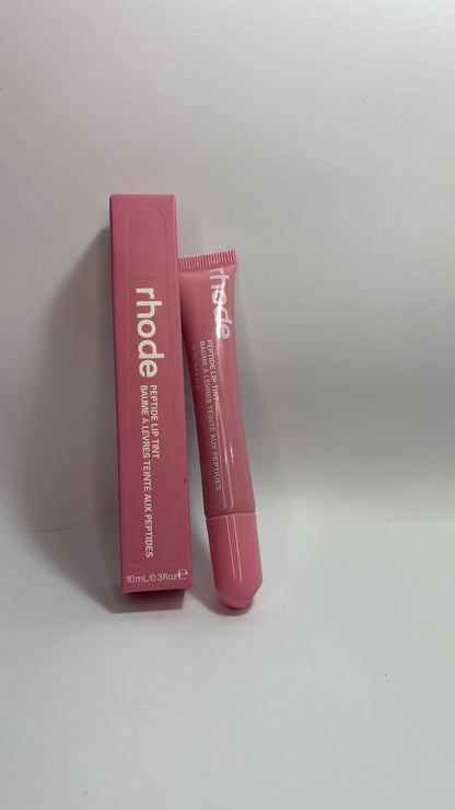 Rhode Peptide Lip Tint in Ribbon – soft baby pink lip care with peptides, lightweight hydrating color for everyday wear.”
