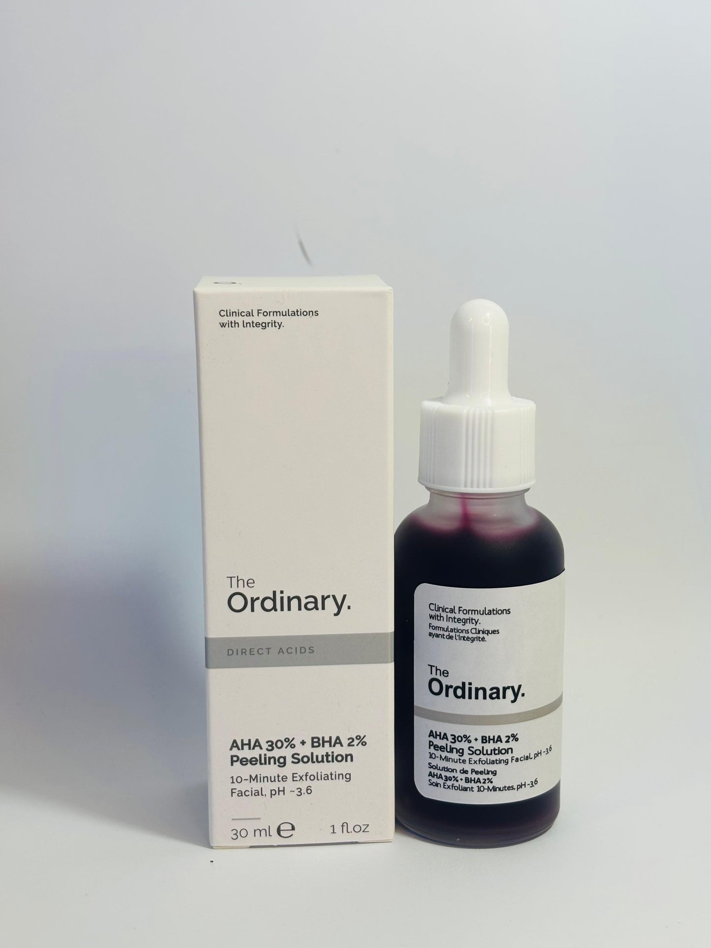 The Ordinary AHA 30% + BHA 2% Peeling Solution bottle and box on a white background The Ordinary Niacinamide 10% + Zinc 1% Serum 30ml Bottle – Amora Mega Store