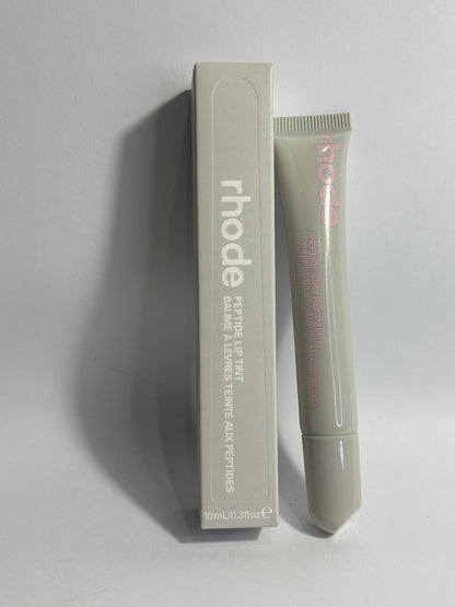 “Rhode Peptide Lip Tint in Page Vine – rich plum berry shade with hydrating peptide formula, smooth glossy finish, clean beauty lip care.”