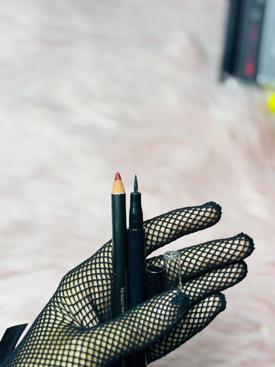 “Black eyeliner pen and red lip liner pencil – precision makeup tools for bold eyes and defined lips”

