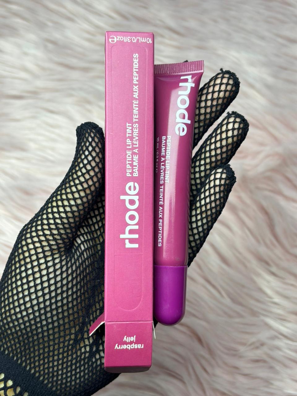 “Rhode Peptide Lip Tint in Raspberry Jelly – moisturizing tinted lip balm with peptides for glossy, soft lips”